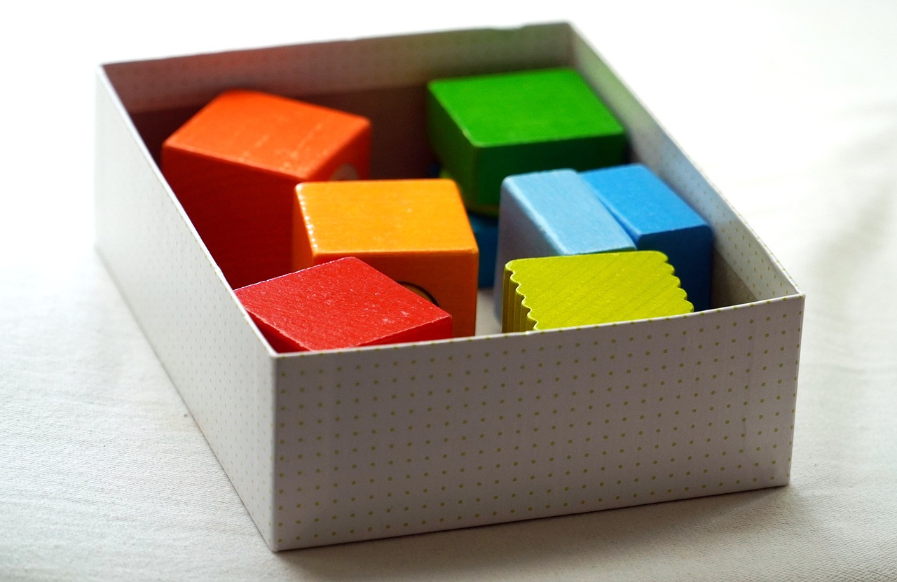 Colourful magnetic building tiles assembled into a structure