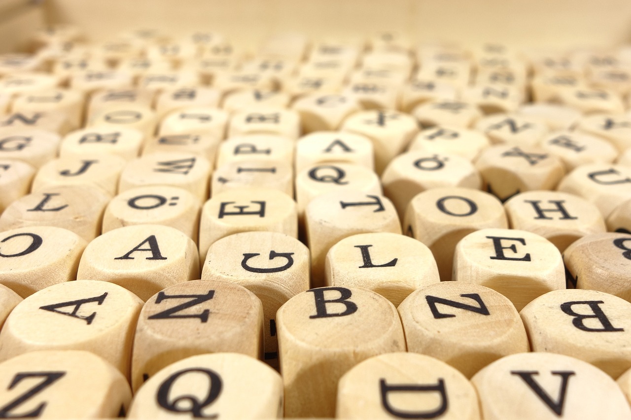 Wooden alphabet puzzle with letter pieces
